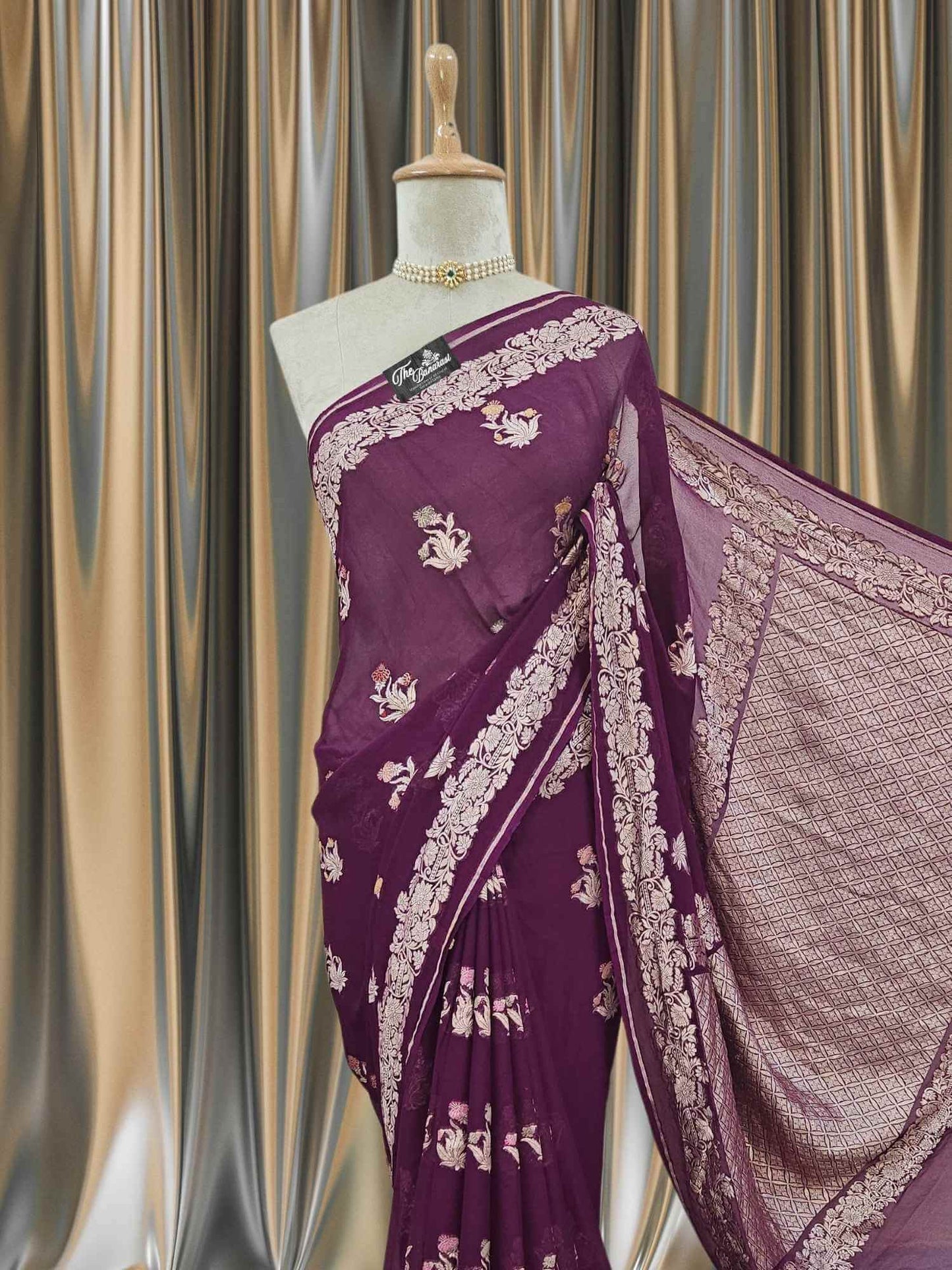 Close-up of Wine Purple Handwoven Traditional Khaddi Georgette Banarasi Saree with Meenakari Design