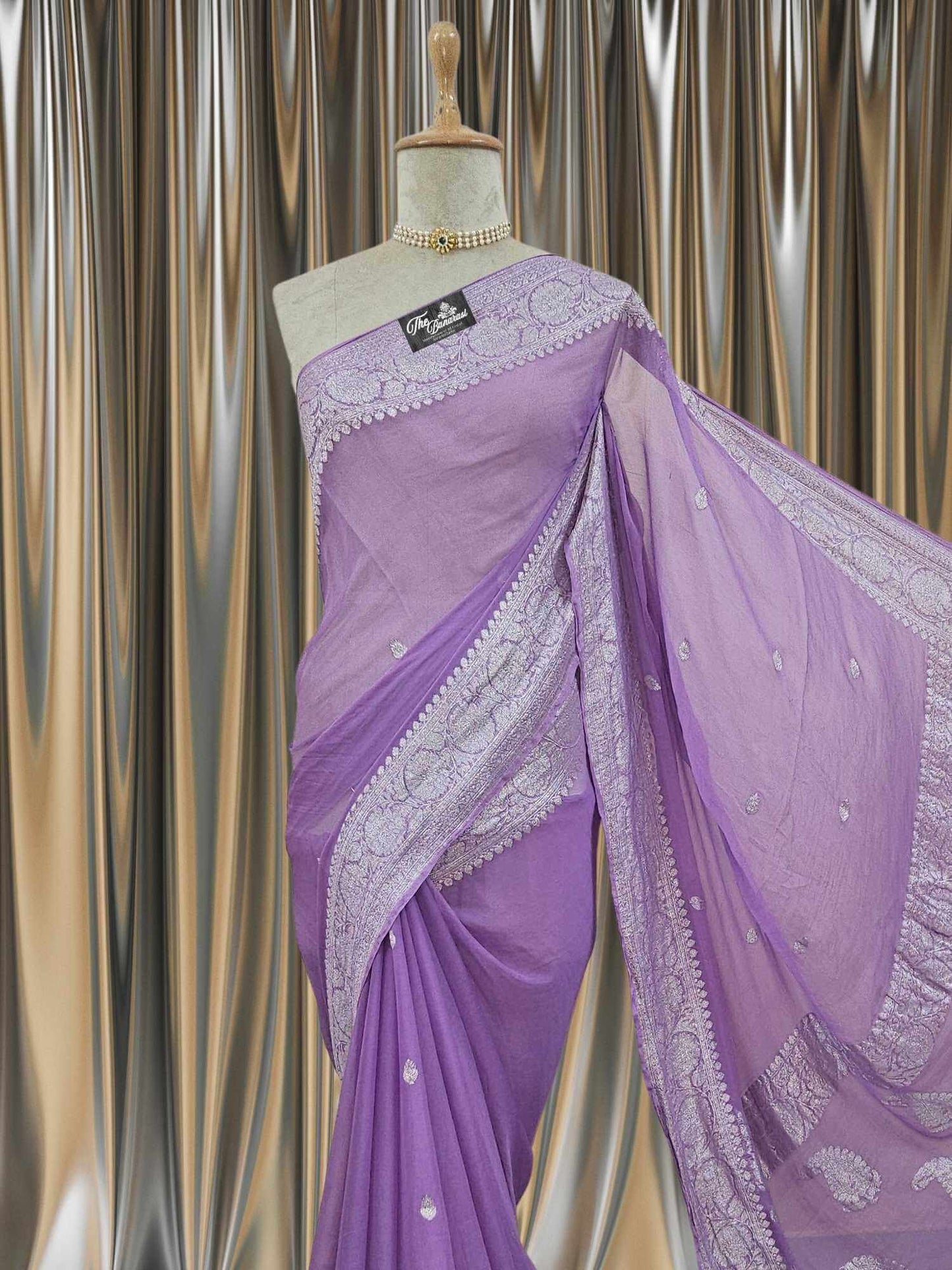Close-up of Elegant Iris Purple Handcrafted Khaddi Georgette Banarasi Saree with Silver Zari Work