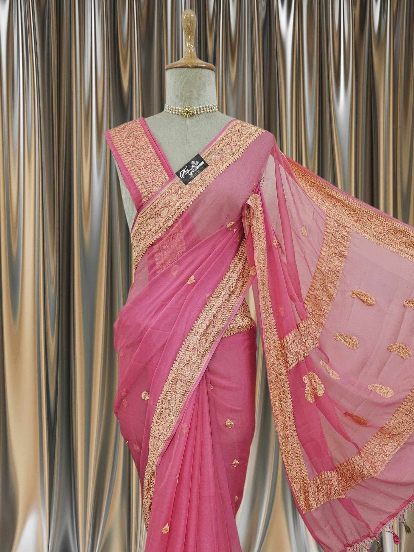 Close-up of Elegant Strawberry Pink Handcrafted Khaddi Georgette Banarasi Saree with Silver Zari Work