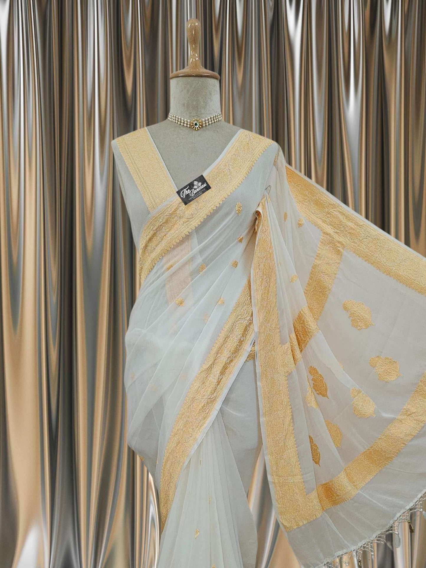 Close-up of Elegant White Handcrafted Khaddi Georgette Banarasi Saree with Silver Zari Work