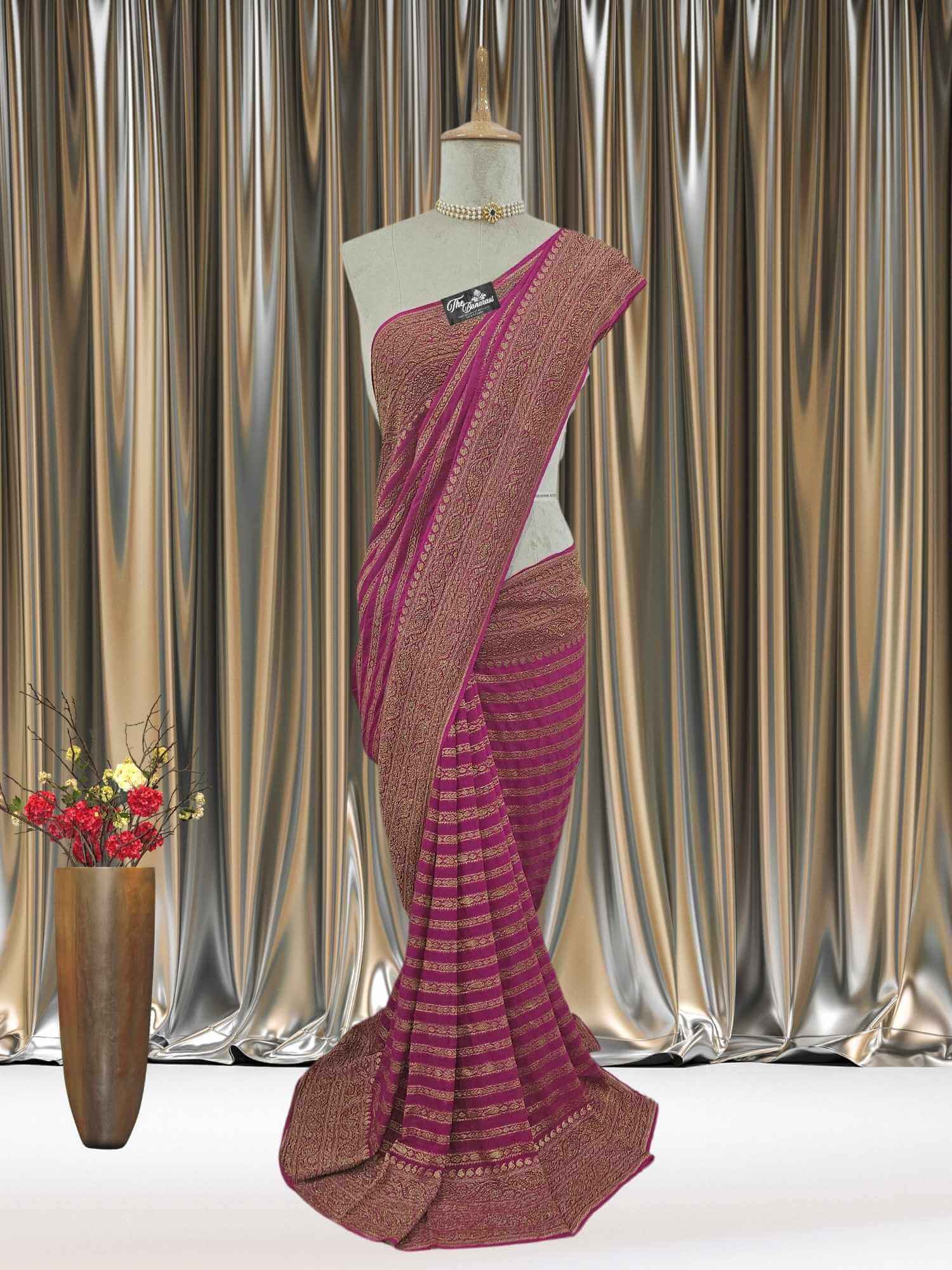 Mannequin wearing Magenta Khaddi Georgette Handwoven Banarasi Saree with Antique Zari Work - Full View