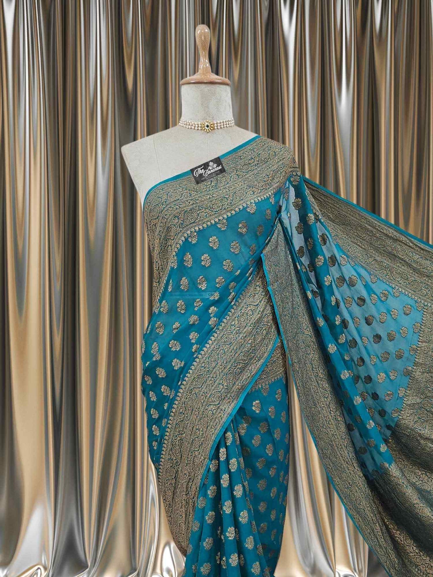 Close-up of Pine Green Khaddi Georgette Handwoven Banarasi Saree with Antique Zari Work