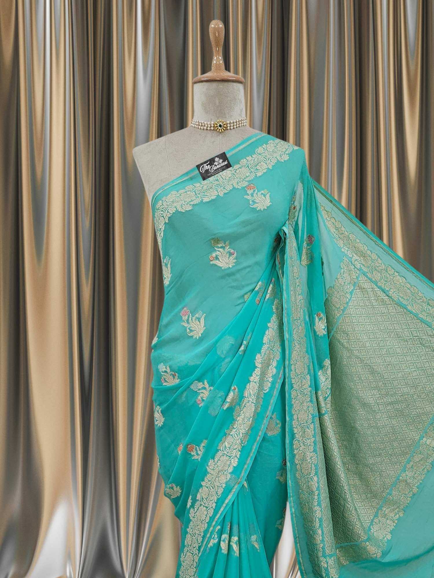 Close-up of Aquamarine Blue Handwoven Traditional Khaddi Georgette Banarasi Saree with Meenakari Design