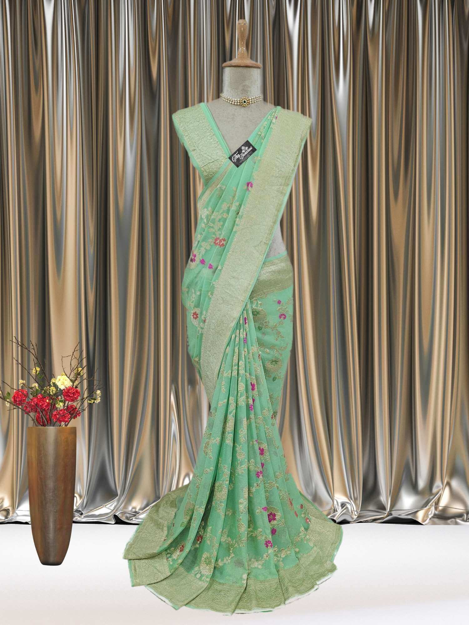 Mannequin wearing Tea Green Handwoven Traditional Khaddi Georgette Banarasi Saree with Meenakari Design - Full View
