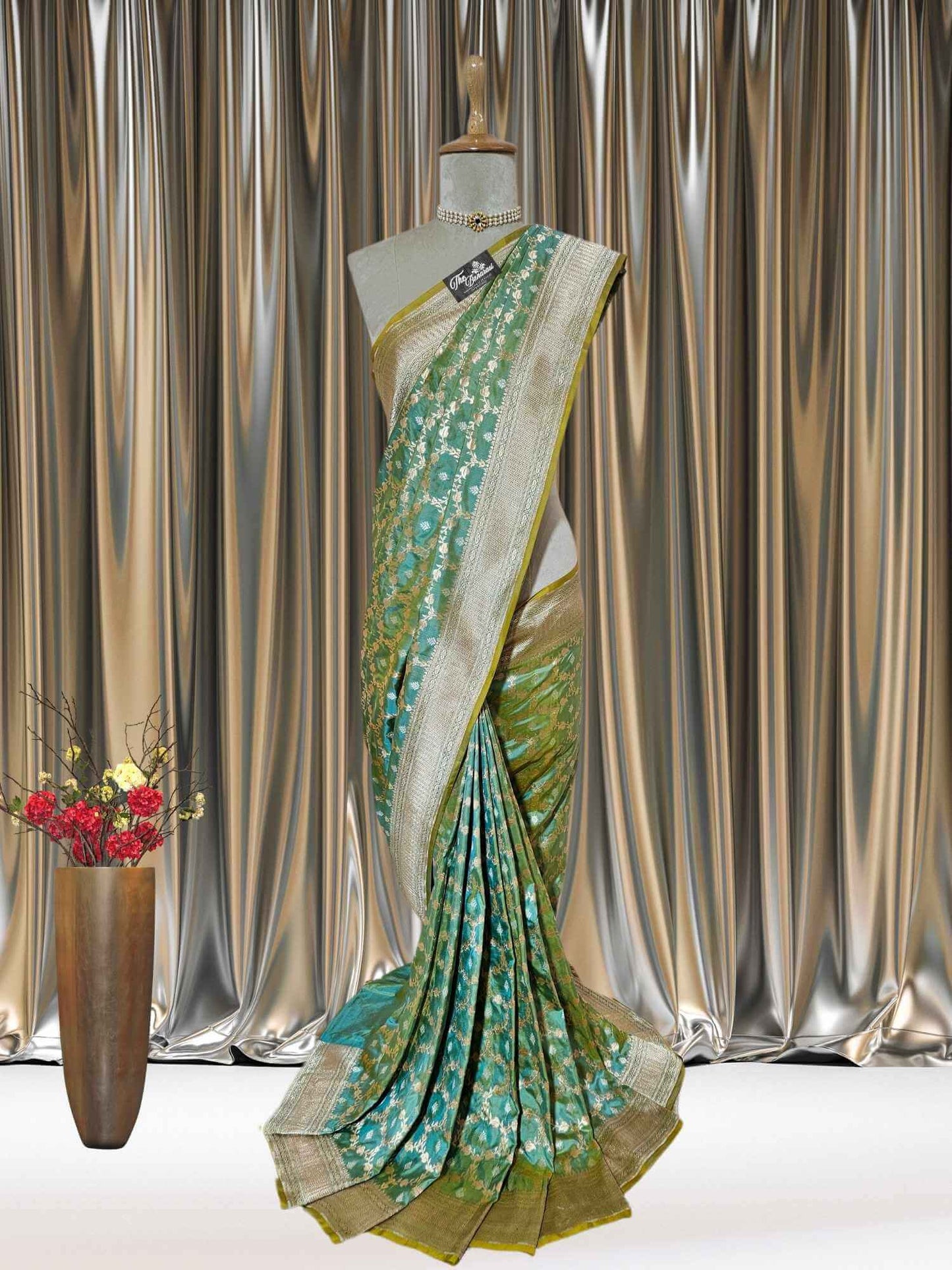 Mannequin wearing Umber Green Katan Silk Handwoven Banarasi Saree with Sona Roopa Work - Full View