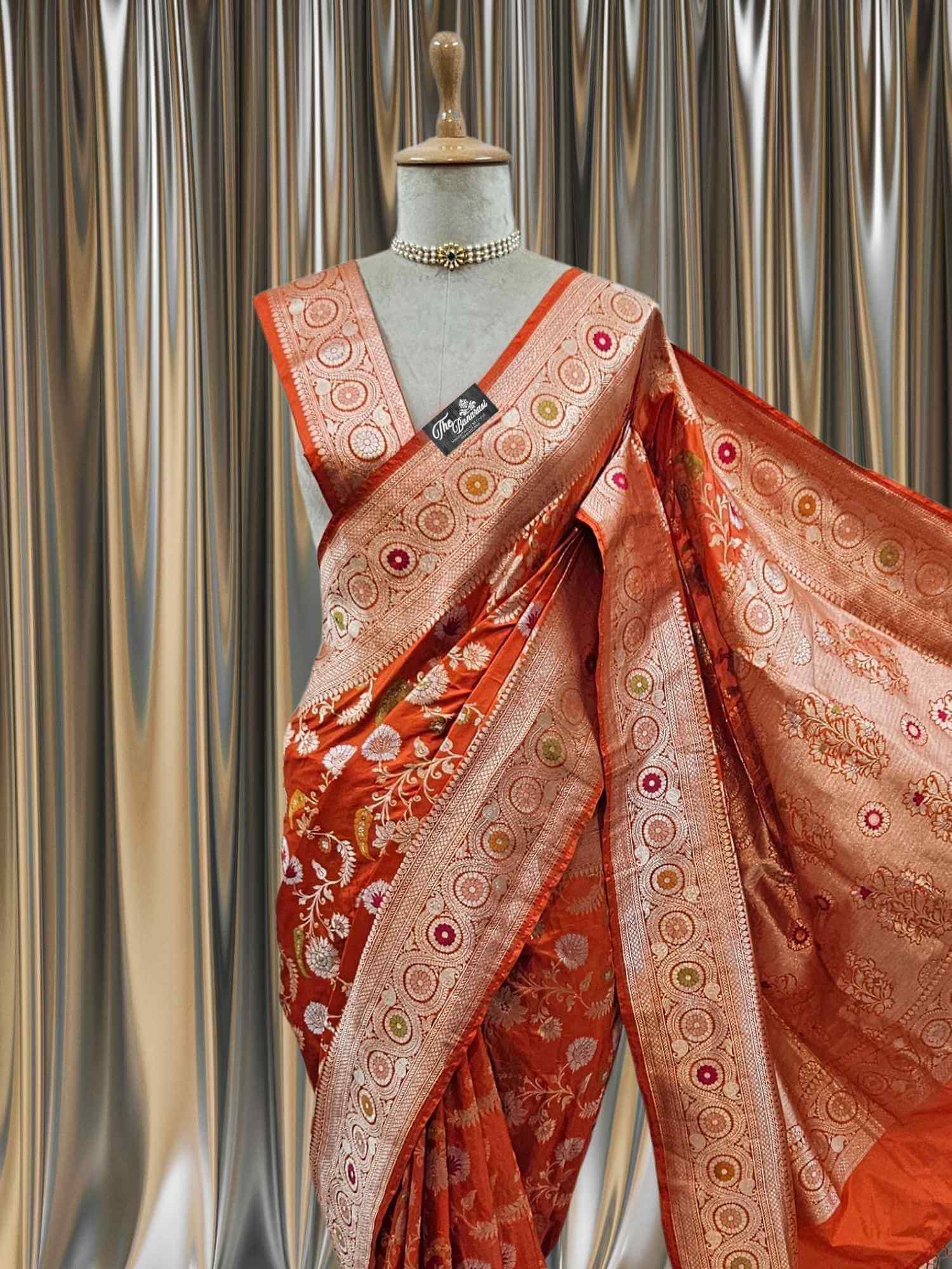 Close-up of Orange Katan Silk Handwoven Banarasi Saree with Meenakari Design