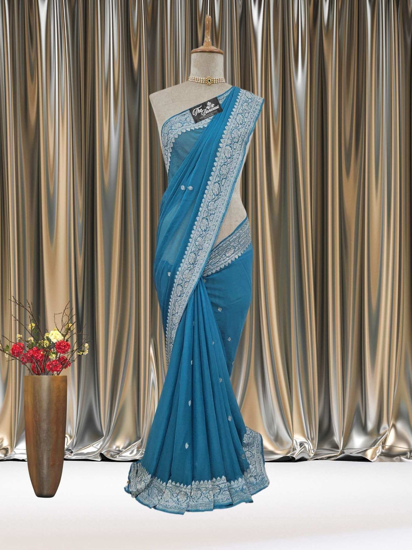 Mannequin wearing Elegant Arure Blue Handcrafted Khaddi Georgette Banarasi Saree with Silver Zari Work - Full View