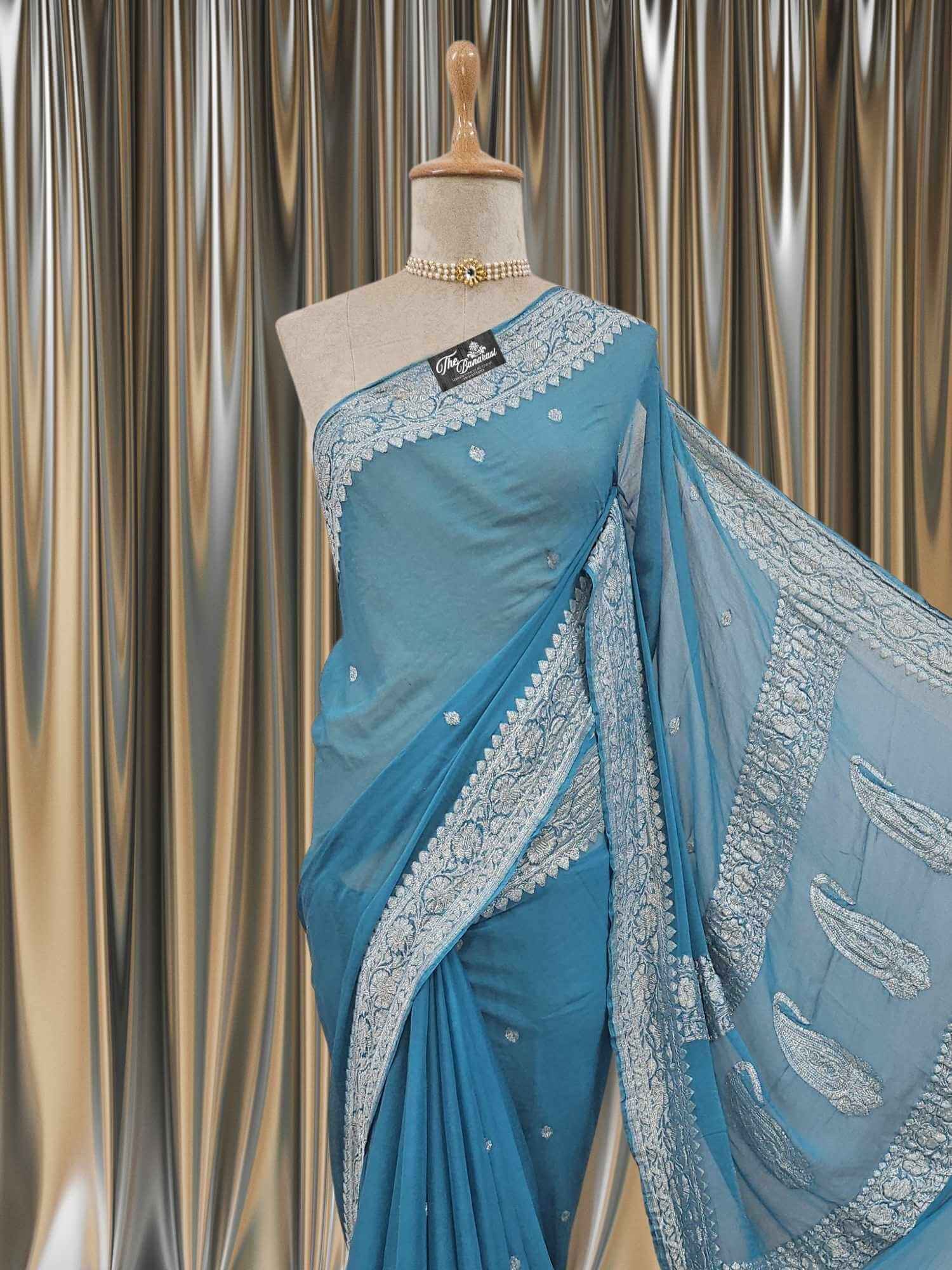 Close-up of Elegant Arure Blue Handcrafted Khaddi Georgette Banarasi Saree with Silver Zari Work