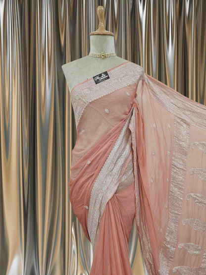 Close-up of Elegant Peach Handcrafted Khaddi Georgette Banarasi Saree with Silver Zari Work