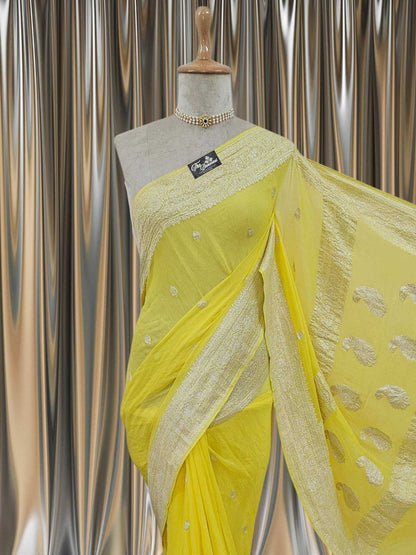 Close-up of Elegant Canary Yellow Handcrafted Khaddi Georgette Banarasi Saree with Silver Zari Work