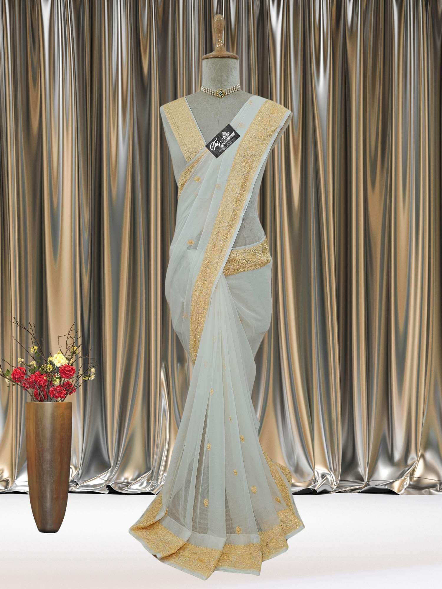 Mannequin wearing Elegant White Handcrafted Khaddi Georgette Banarasi Saree with Silver Zari Work - Full View