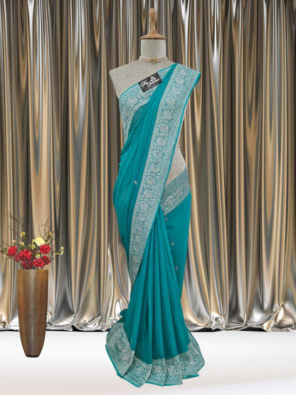 Mannequin wearing Elegant Sky Blue Handcrafted Khaddi Georgette Banarasi Saree with Silver Zari Work - Full View